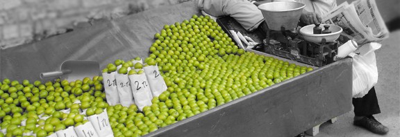 Istanbul Turkey street vendor selling Sour plums Black and White
